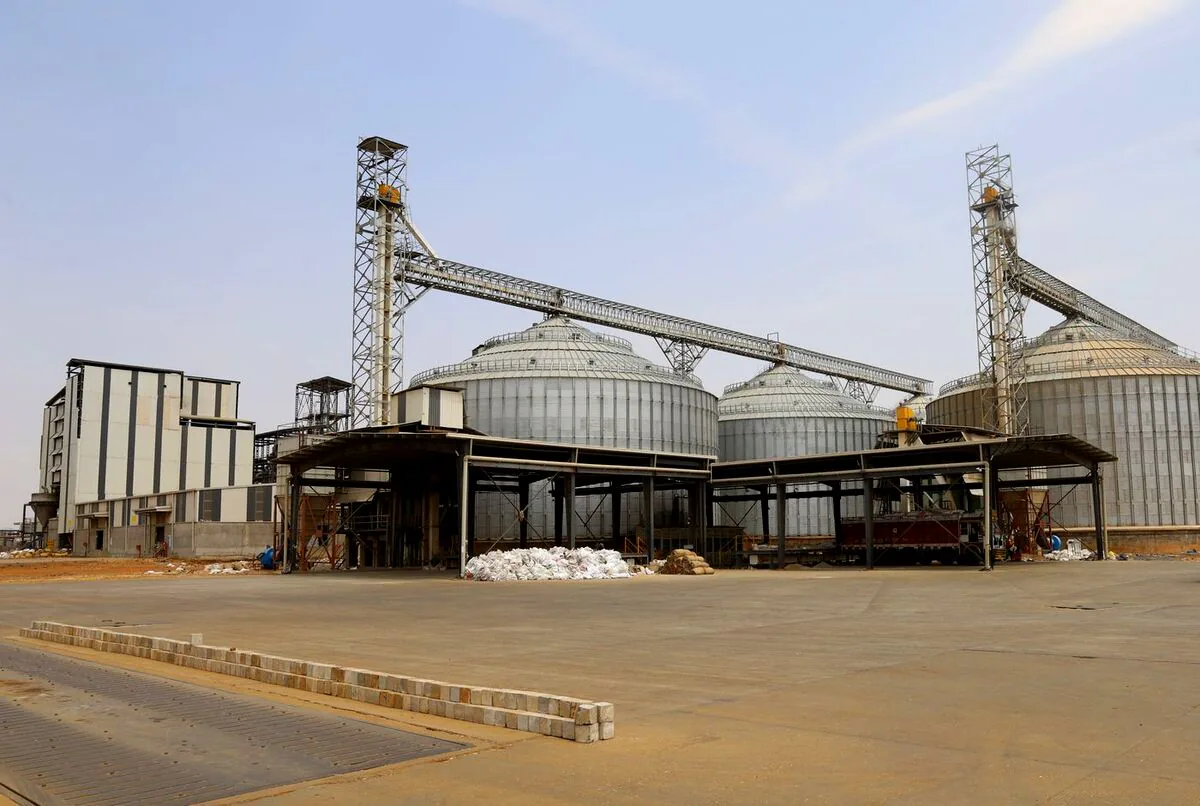 Grain storage silos and intake conveyors at a bulk handling facility